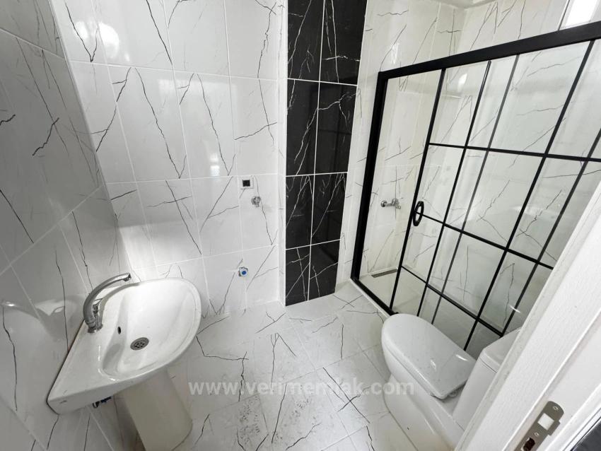 Luxuriöse Und Komfortable 2+1-Zimmer-Villa In Einer Anlage Mit Olympischem Schwimmbecken In Seferihisar Zu Verkaufen!