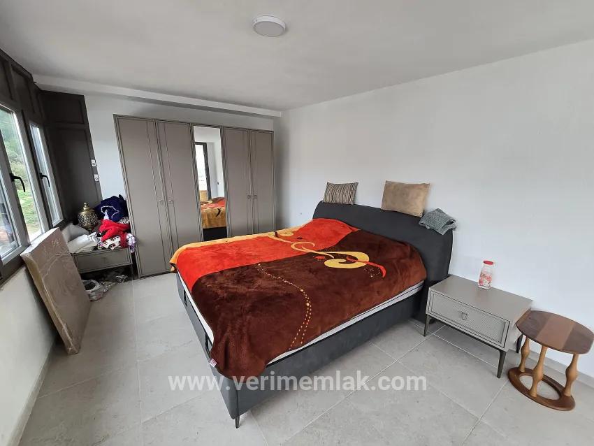 In Seferihisar Ürkmez, eine etwa 600 m entfernte, großzügige gartenumschlossene 3+1 Sommerhaus-villa