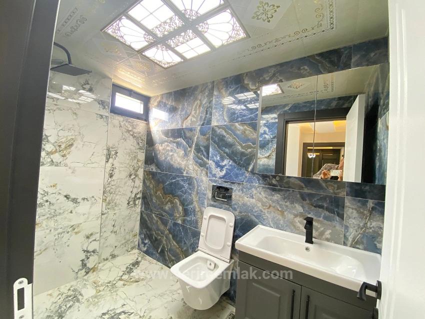 Freistehende Villa Mit 4 Schlafzimmern Und 2 Bädern In Doğanbey Mit Meerblick Auf Einem 280 M² Großen Grundstück!