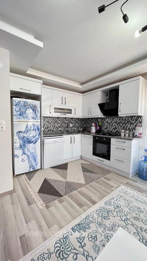 2+1 75 M² Große Mittelhohe Wohnung (2+1) Mit Doppelbalkon In Gumuldur Zu Verkaufen