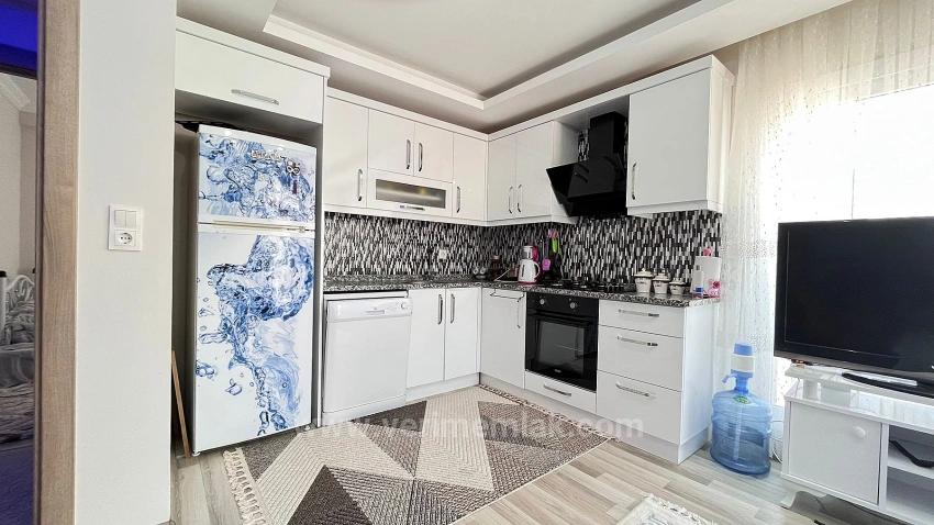 2+1 75 M² Große Mittelhohe Wohnung (2+1) Mit Doppelbalkon In Gumuldur Zu Verkaufen