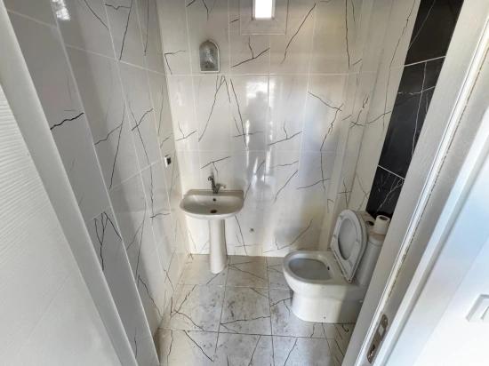 Luxuriöse Und Komfortable 2+1-zimmer-villa In Einer Anlage Mit Olympischem Schwimmbecken In Seferihisar Zu Verkaufen!