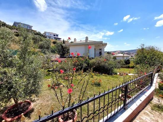 İzmir Seferihisar Doğanbey direkt am Meer null Site mit Garten zum Verkaufen 4+1 Sommerhaus –