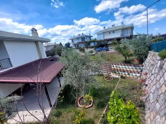 İzmir Seferihisar Doğanbey direkt am Meer null Site mit Garten zum Verkaufen 4+1 Sommerhaus –