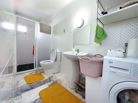 In Seferihisar Doğanbey gibt es eine villenartige Immobilie mit Garten und Meerblick zum Verkauf – 4+1 Villa