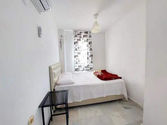 In Seferihisar Doğanbey gibt es eine villenartige Immobilie mit Garten und Meerblick zum Verkauf – 4+1 Villa