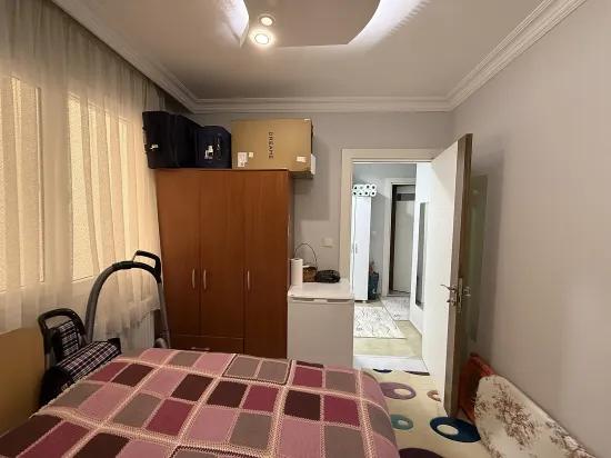 Seferihisars bevorzugtes Viertel bietet eine Gelegenheit 2+1 Wohnung zum Verkauf