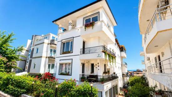 In Özdere Çukuraltı fußläufiger Entfernung zum Meer Gelegenheit! 4+2 (2 Wohnungen)