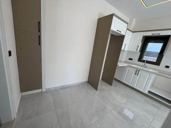 In Gümüldür In zentraler Lage mit Garten, mit Aufzug, 400m zum Meer, zu verkaufen, 1+1 Wohnung