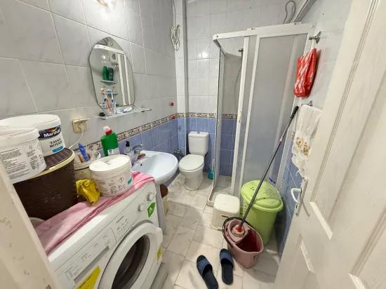 Im Seferihisar Mersin Gebiet 150 m zum Meer kostenfrei, geräumig zu verkaufen 2+1 Wohnung