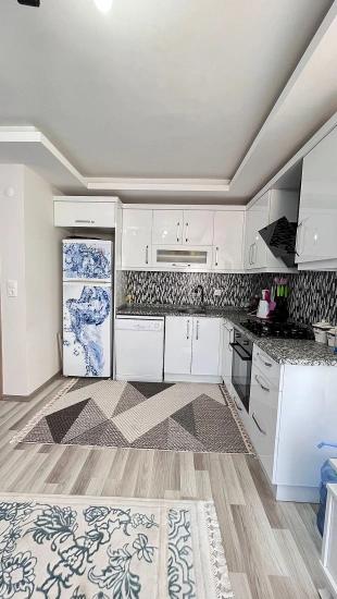 2+1 75 M² Große Mittelhohe Wohnung (2+1) Mit Doppelbalkon In Gumuldur Zu Verkaufen