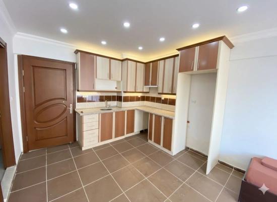 1+1-Apartments Zum Verkauf In Ürkmez, 50 M Vom Meer Entfernt, In Zentraler Lage