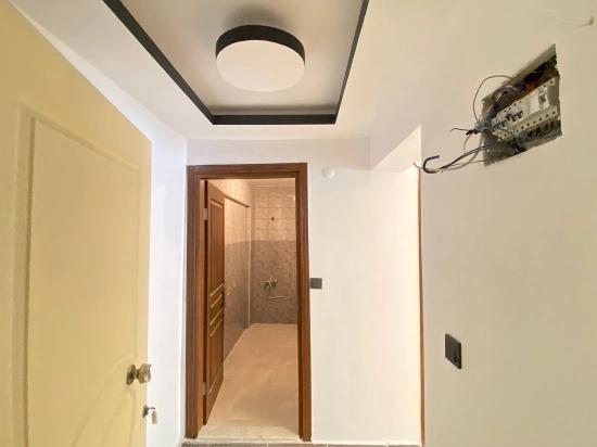 50 M Zum Meer Mit Aufzug In Der Gegend Von Seferihisar Mersin! 1+1 Wohnung Zum Verkauf Mit Moderner Architektur