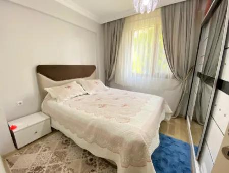 2 1 Wohnung Zum Verkauf Im Zentrum Von Ürkmez Mit 300M2 Garten Im Erdgeschoss Zum Meer