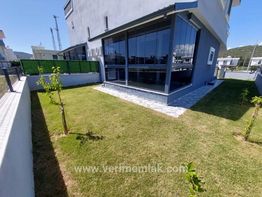 In the Republic Neighbourhood of Seferihisar, 1 km to the sea, a 4+1 wide garden luxurious villa for sale