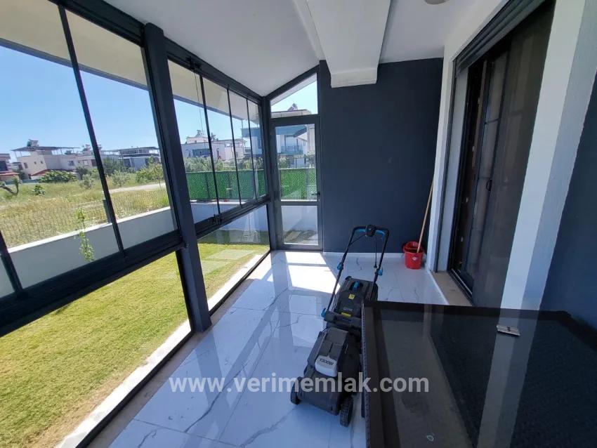 In the Republic Neighbourhood of Seferihisar, 1 km to the sea, a 4+1 wide garden luxurious villa for sale