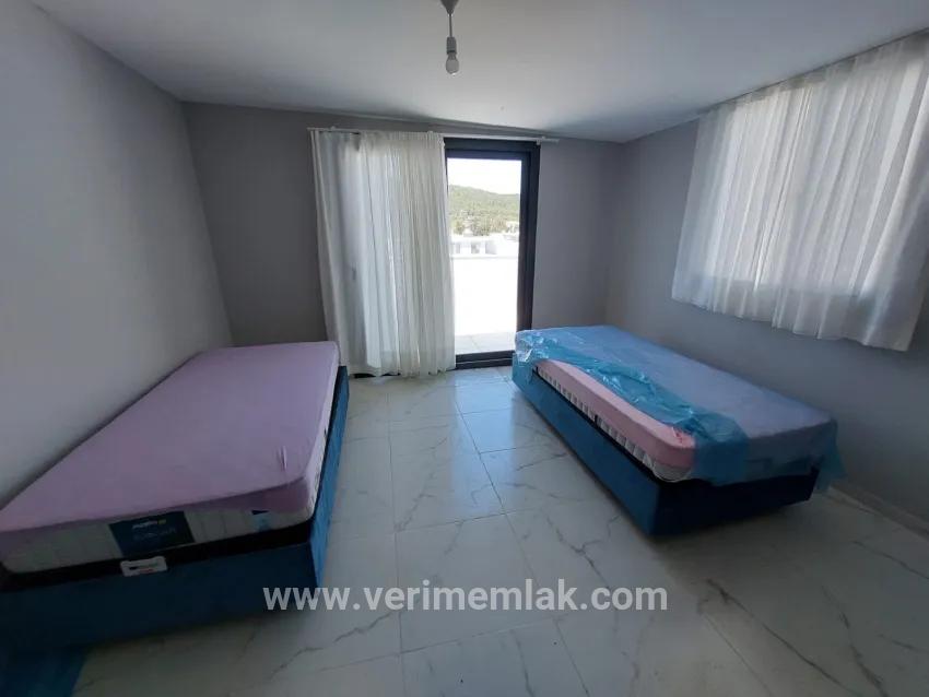 In the Republic Neighbourhood of Seferihisar, 1 km to the sea, a 4+1 wide garden luxurious villa for sale