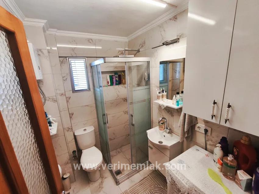 On Gümüldür Beach 1+1 50 m2 furnished at an appropriate price for sale apartment