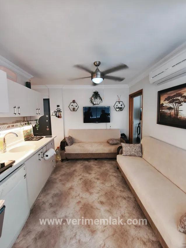 On Gümüldür Beach 1+1 50 m2 furnished at an appropriate price for sale apartment