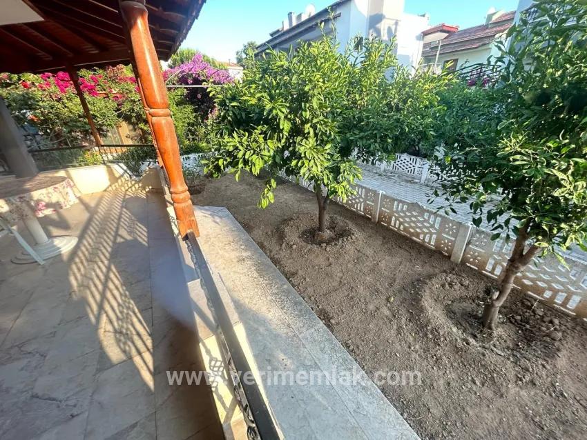 In Gümüldür, a 4+1 villa for sale with a large garden within a 100m site from the sea