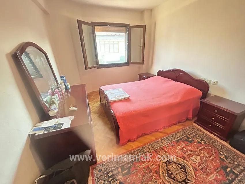 In Gümüldür, a 4+1 villa for sale with a large garden within a 100m site from the sea