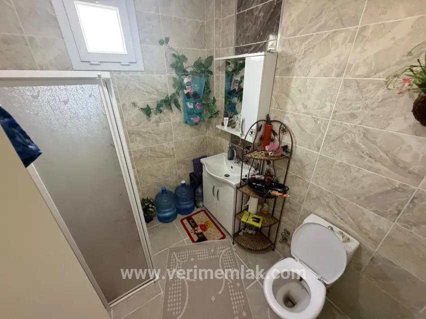 In Seferihisar Bengiler, 350m to the sea, a 2+1 apartment for sale with a wide garden with fruit trees!