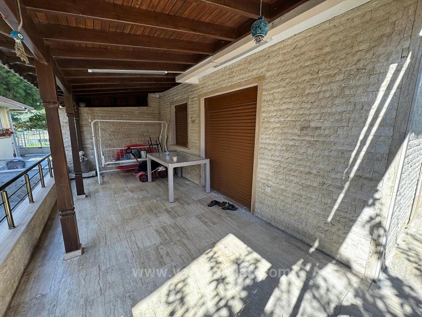 Furnished 5+1 Villa With A Large Garden For Sale In Gumuldur, 50 Meters From The Sea