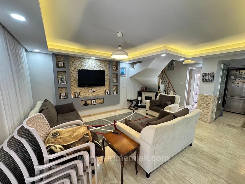 Furnished 5+1 Villa With A Large Garden For Sale In Gumuldur, 50 Meters From The Sea