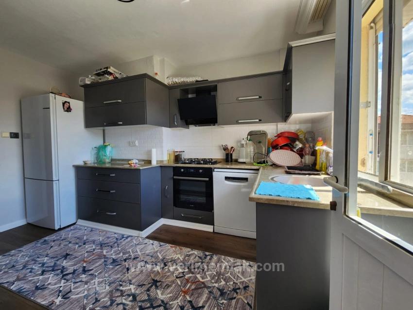 3+1 Apartment For Sale In Ürkmez, Middle Floor With Elevator In The City Center