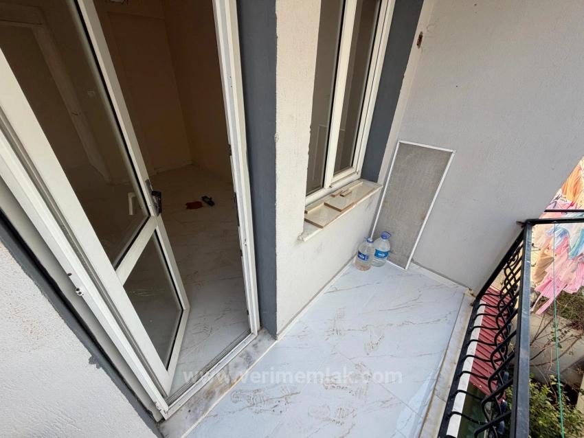 2+1 Apartment For Sale In Seferihisar Bengiler, 150M From The Sea, Above A Market.