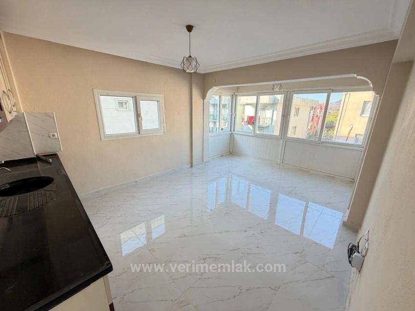 2+1 Apartment For Sale In Seferihisar Bengiler, 150M From The Sea, Above A Market.