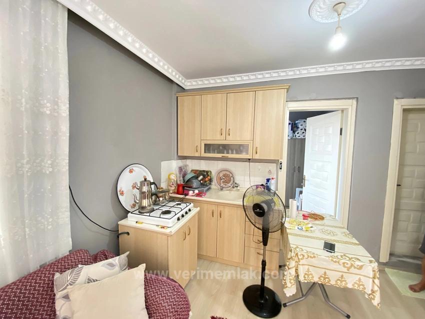 1+1 Ground Floor Apartment For Sale In Seferihisar Mersin Area, 100M From The Sea, With Garden And Renovation Required