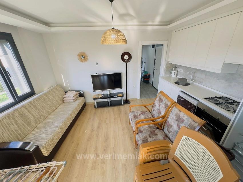 2+1 Apartment For Sale In Seferihisar Mersinalanı, Close To The Sea, Ground Floor With Garden