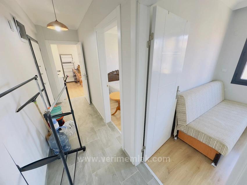 2+1 Apartment For Sale In Seferihisar Mersinalanı, Close To The Sea, Ground Floor With Garden