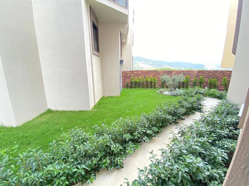 2+1 Ground Floor Apartment For Sale With Elevator In The Market Center Of Gumuldur