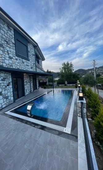 3+1 Detached Villa With Pool And Garden For Sale In Gumuldur