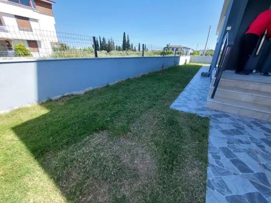 In the Republic Neighbourhood of Seferihisar, 1 km to the sea, a 4+1 wide garden luxurious villa for sale