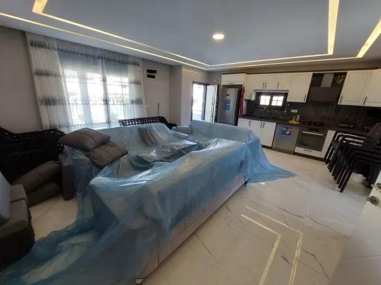 In the Republic Neighbourhood of Seferihisar, 1 km to the sea, a 4+1 wide garden luxurious villa for sale