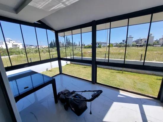 In the Republic Neighbourhood of Seferihisar, 1 km to the sea, a 4+1 wide garden luxurious villa for sale