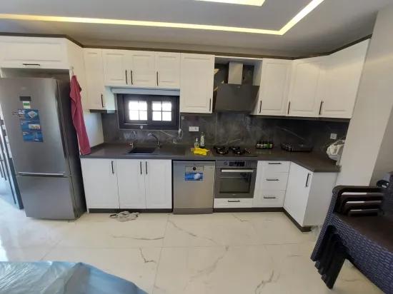 In the Republic Neighbourhood of Seferihisar, 1 km to the sea, a 4+1 wide garden luxurious villa for sale