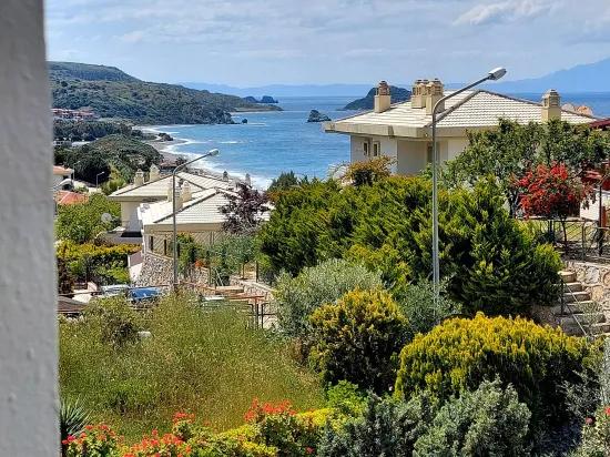 İzmir Seferihisar Doğanbey sea zero site with garden for sale 4+1 summer house –