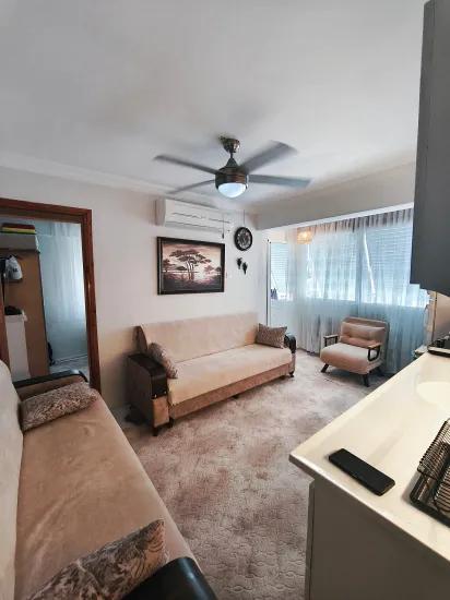 On Gümüldür Beach 1+1 50 m2 furnished at an appropriate price for sale apartment