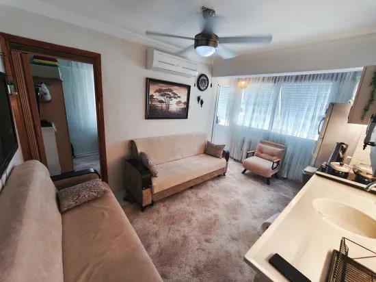 On Gümüldür Beach 1+1 50 m2 furnished at an appropriate price for sale apartment
