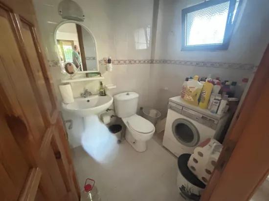 In Gümüldür, a 4+1 villa for sale with a large garden within a 100m site from the sea