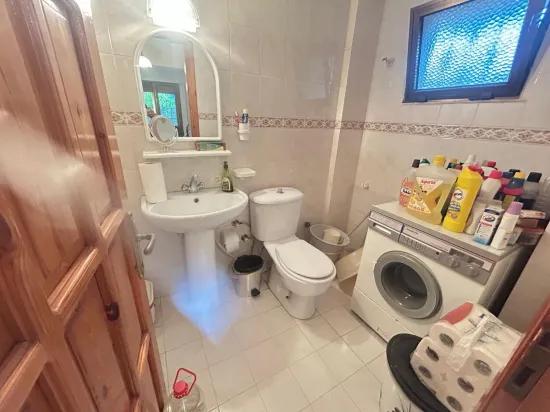 In Gümüldür, a 4+1 villa for sale with a large garden within a 100m site from the sea