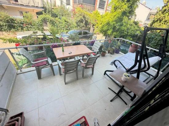 In Seferihisar Bengiler, 350m to the sea, a 2+1 apartment for sale with a wide garden with fruit trees!