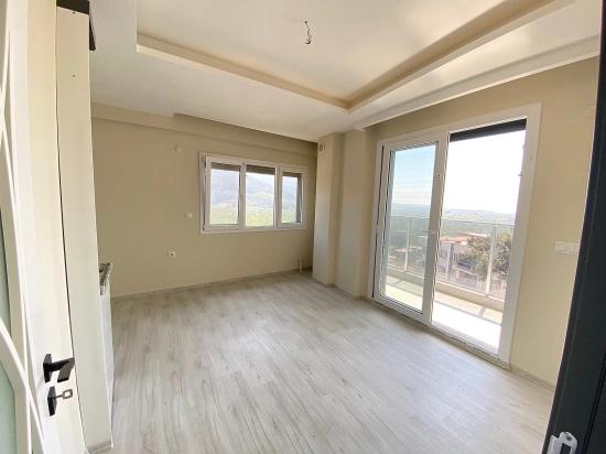 2+1 Sea View Apartment With Elevator For Sale In Gumuldur