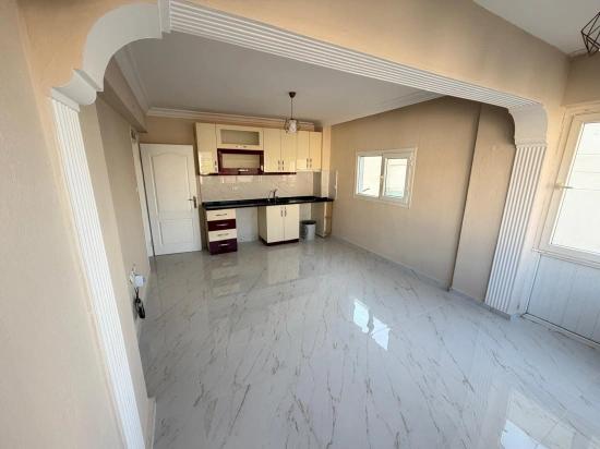 2+1 Apartment For Sale In Seferihisar Bengiler, 150M From The Sea, Above A Market.