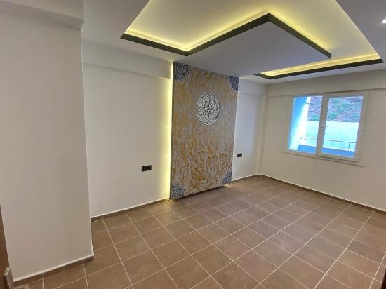 50m To The Sea With Elevator In Seferihisar Mersin Area! 1+1 Flat For Sale With Modern Architecture