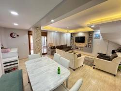 Furnished 5+1 Villa With A Large Garden For Sale In Gumuldur, 50 Meters From The Sea